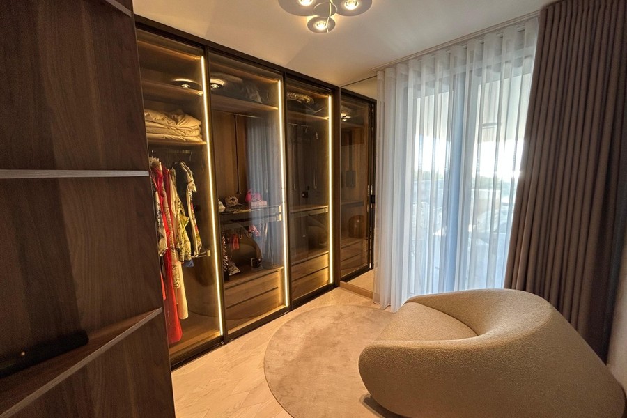Dressing room with illuminated wardrobes