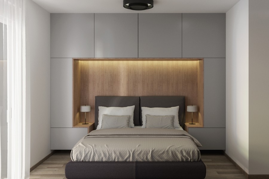 Built-in wardrobe and wood panelling behind the bed