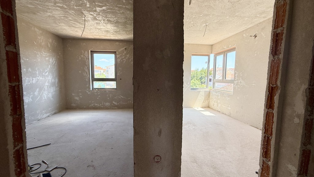 Hallway with a view into the rooms
