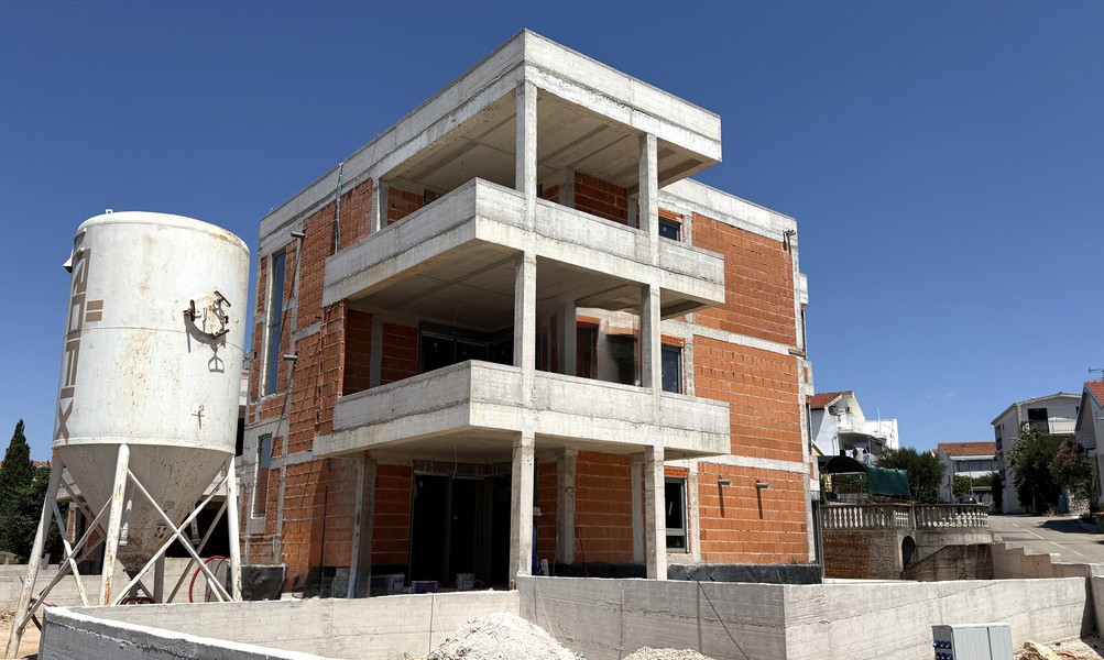 New-build with three apartments under construction