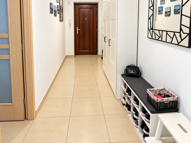 Hallway with mirror and shoe rack