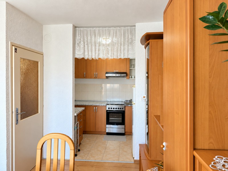 View into kitchen with gas hob