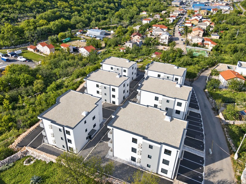 Residential buildings with parking areas from above