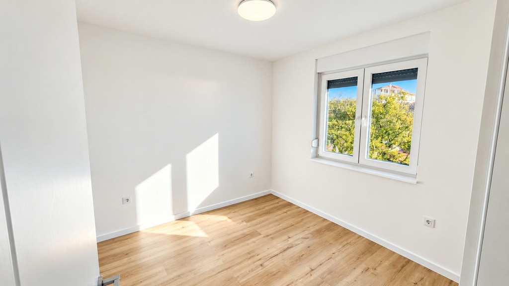 Bedroom with wooden floor