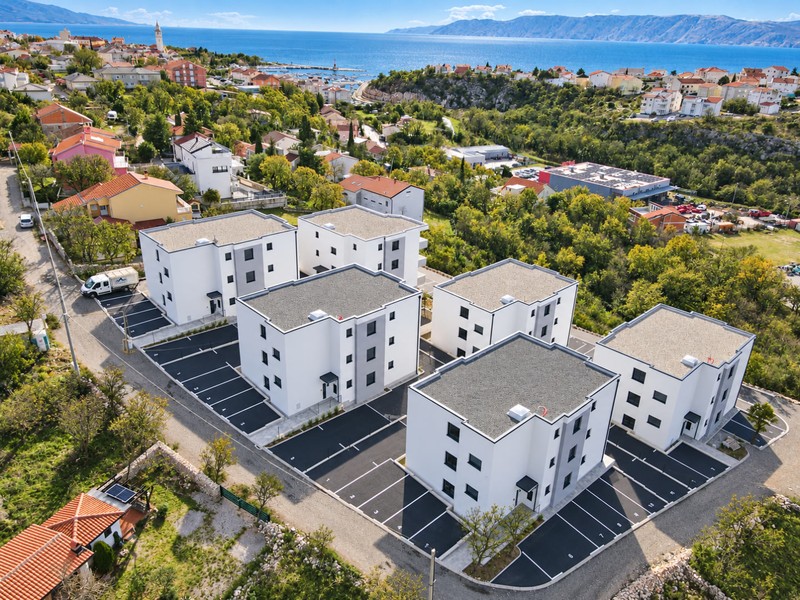Residential buildings with parking spaces, aerial view