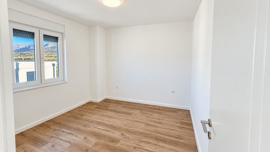 Bedroom with wooden floor
