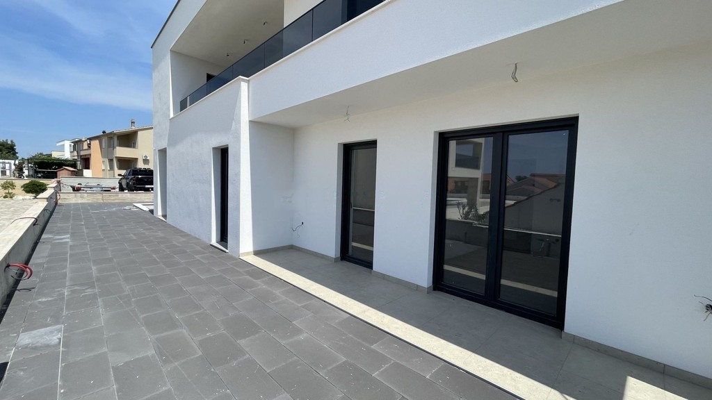 Terrace side with large French doors