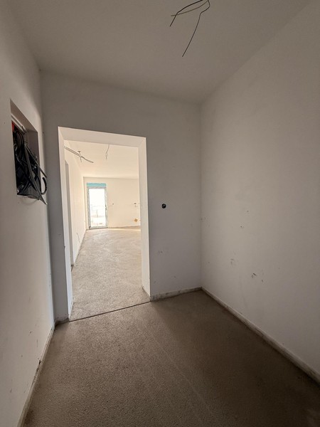 Hallway with view into a room