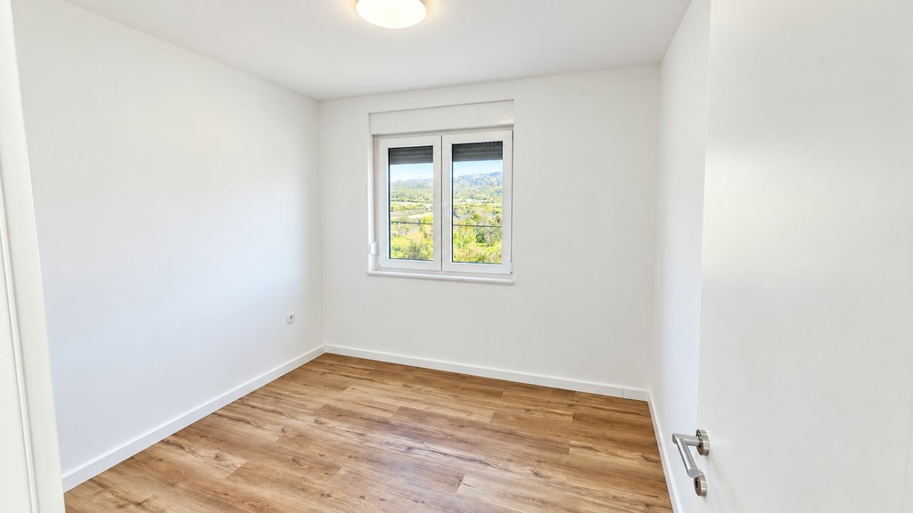 Bedroom with wooden floor