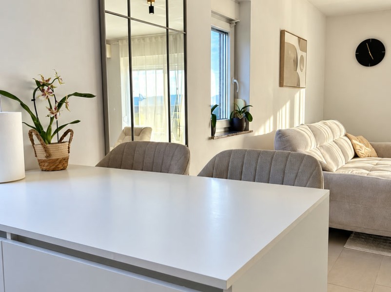 Kitchen island with view into the living room