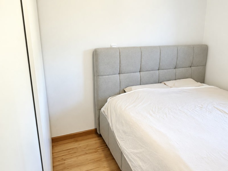 Bedroom with upholstered bed