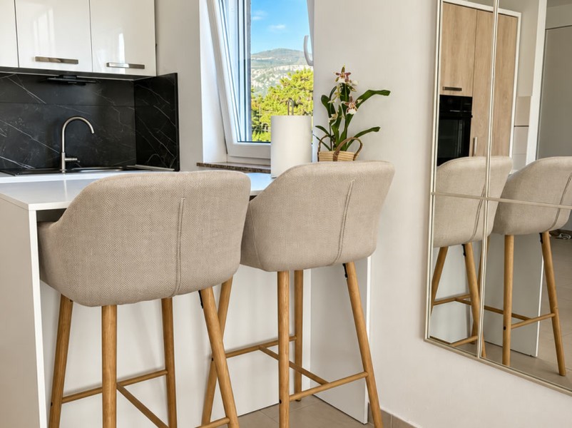 Kitchen counter with bar stools