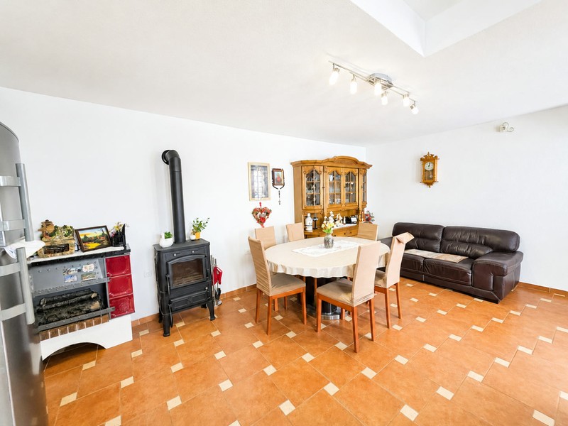Dining area with wood-burning stove