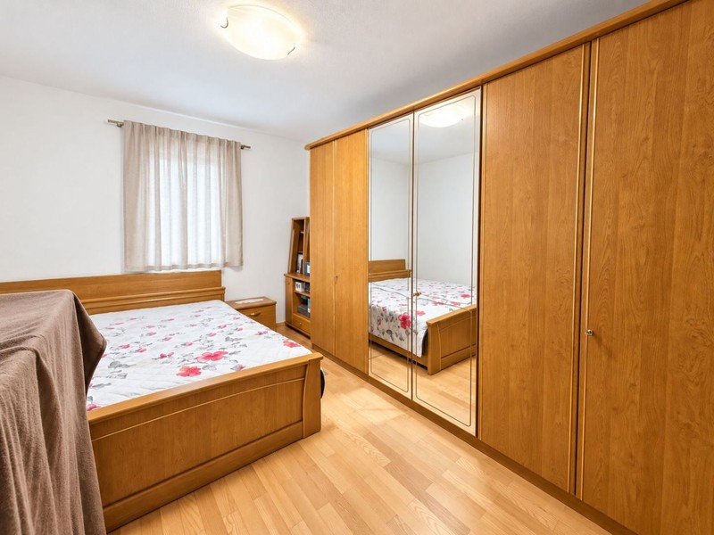 Bedroom with large wardrobe