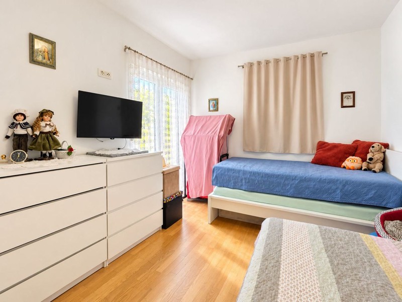 Second bedroom with television