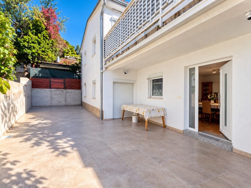 Paved courtyard in front of the residential building