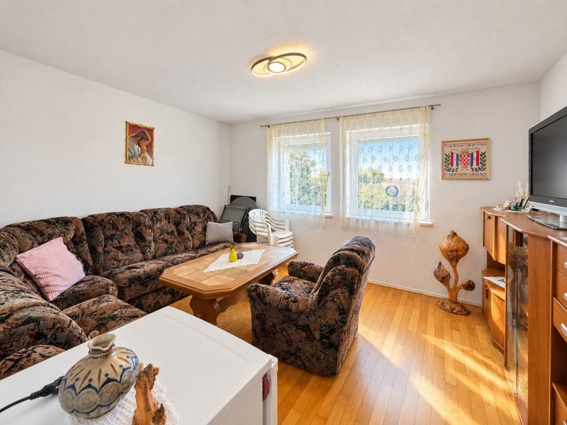Living room with sofa and armchairs