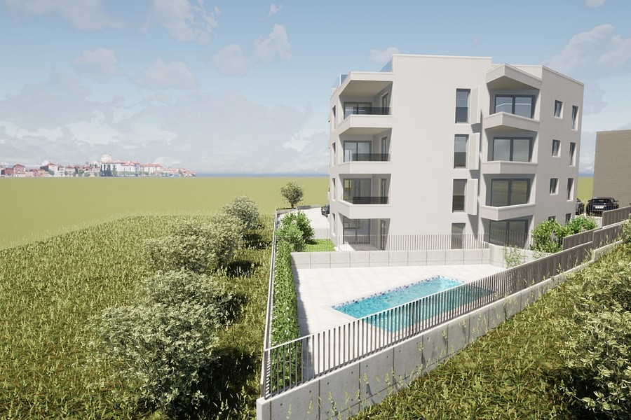 New building from the garden side, sea beyond