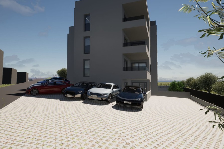 Parking area with grass paving blocks
