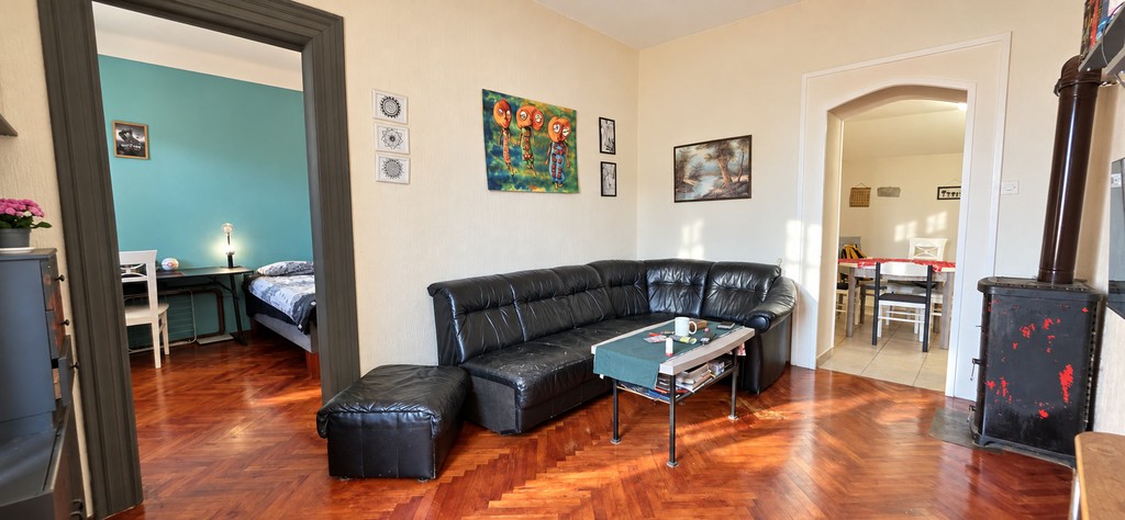 Living area with doorway to the bedroom