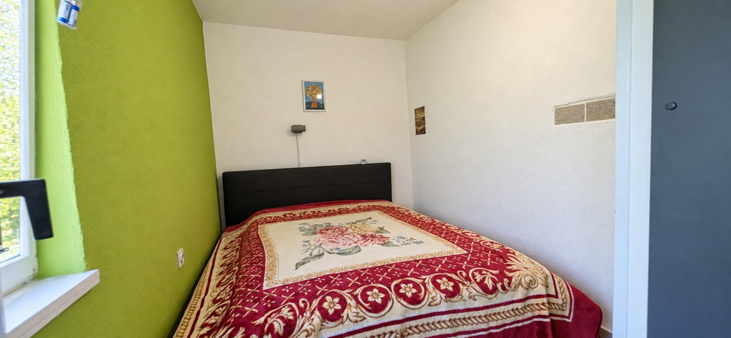 Bedroom with bed and window
