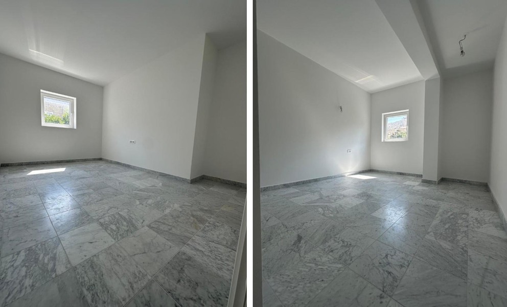 Bedroom with light marble floor and window