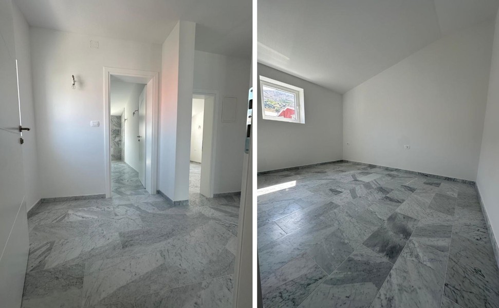 Hallway and room with marble floor