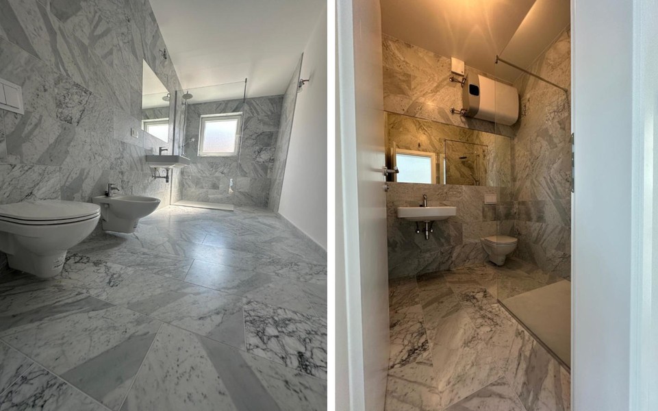Bathroom with shower and washbasin