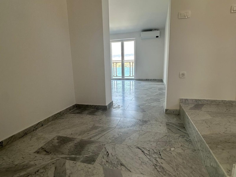 Room with marble floor and view outside