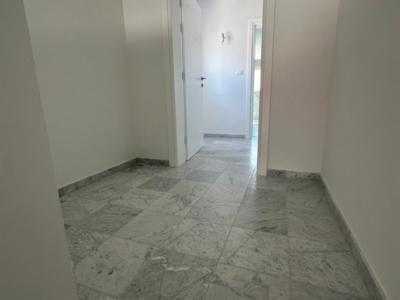 Hallway with doors to the rooms