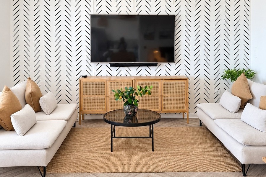 Living area with light-coloured sofa and sideboard