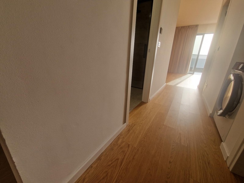 Hallway with wooden floor