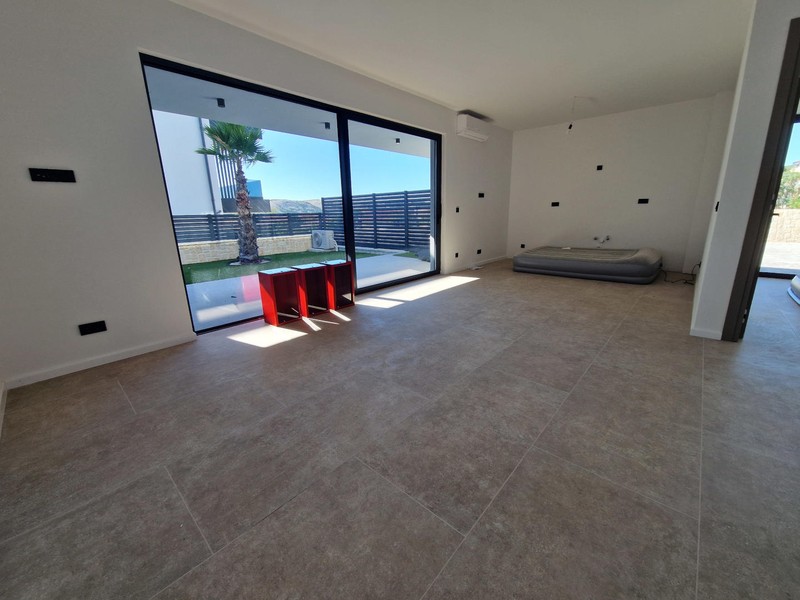 Living room with glass front to the loggia
