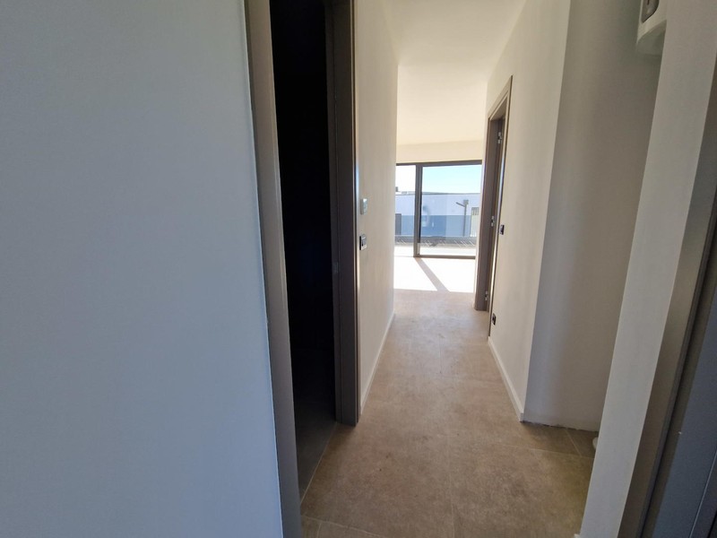 Hallway with view to the loggia