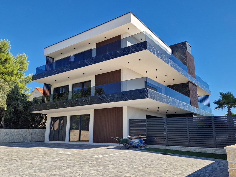 New building with six apartments and balconies