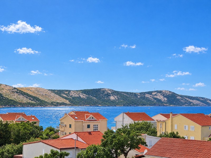 View from the terrace over the rooftops to the sea