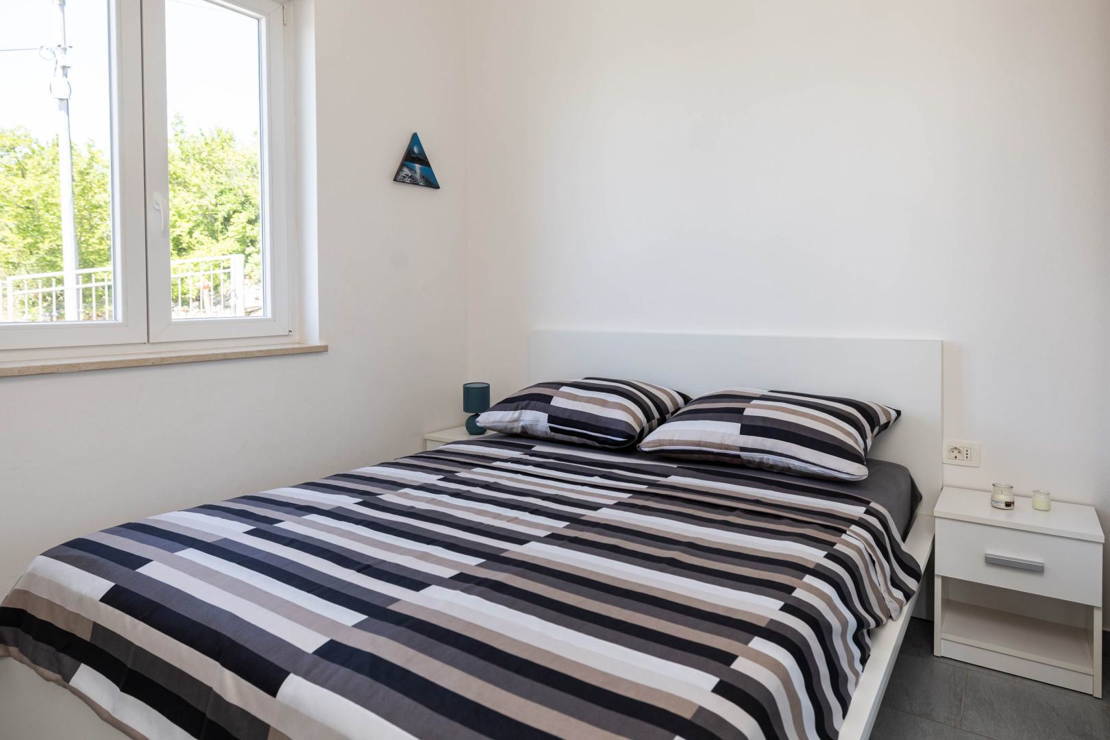 Bedroom with double bed and window