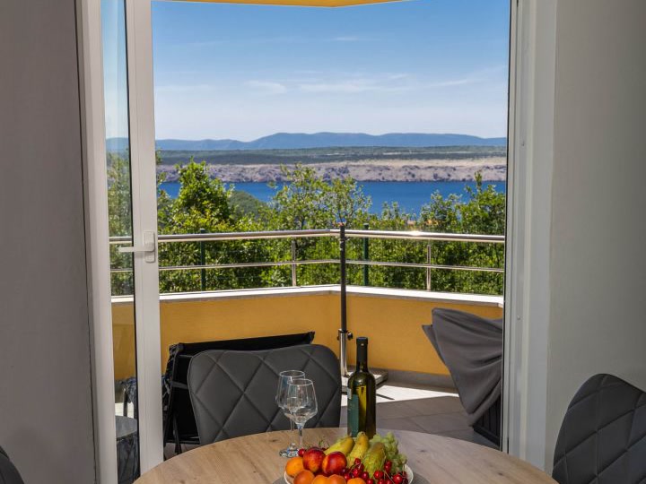 Dining table on the loggia with sea view