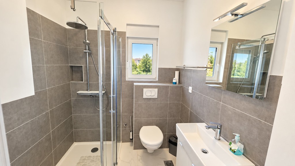 Bathroom with shower and toilet
