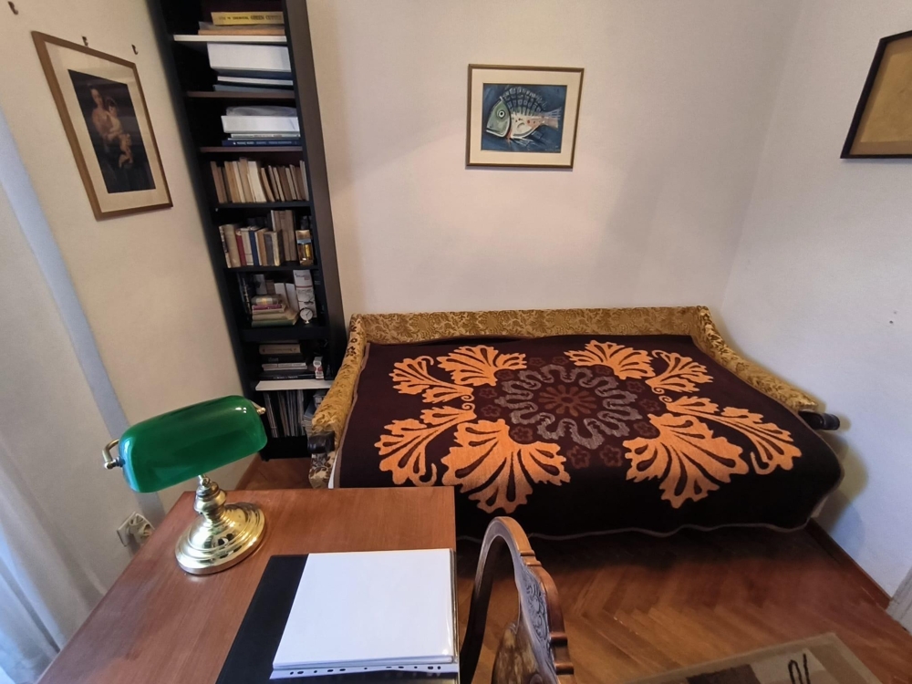 Bedroom with double bed and wooden furniture