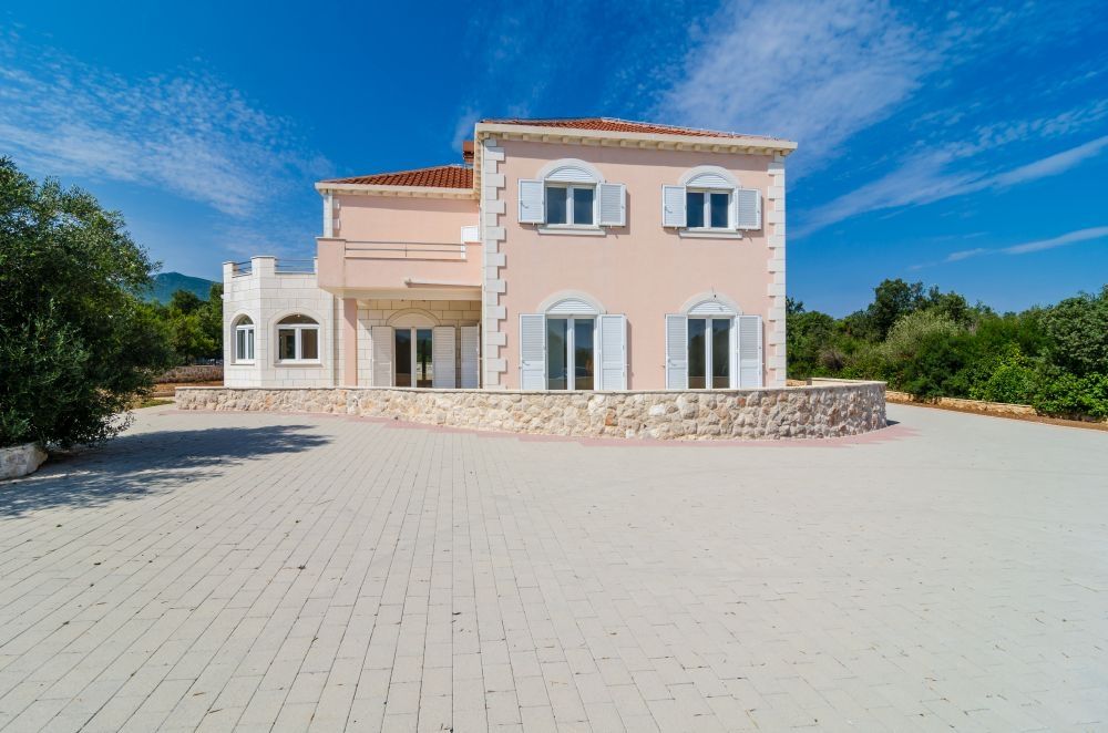 Buy a villa on a large plot in Croatia.