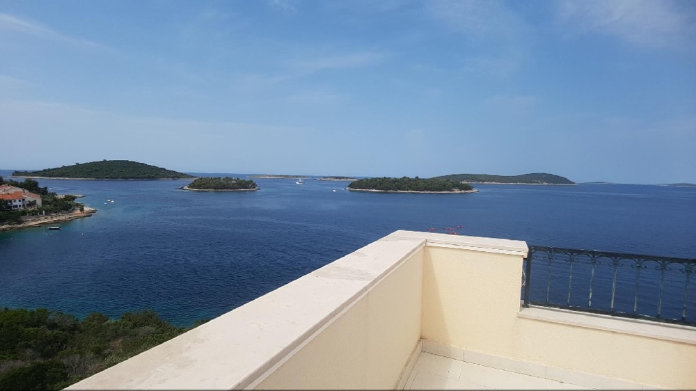 View from the balcony of the sea right next to the villa - multi-family house for sale in Croatia.