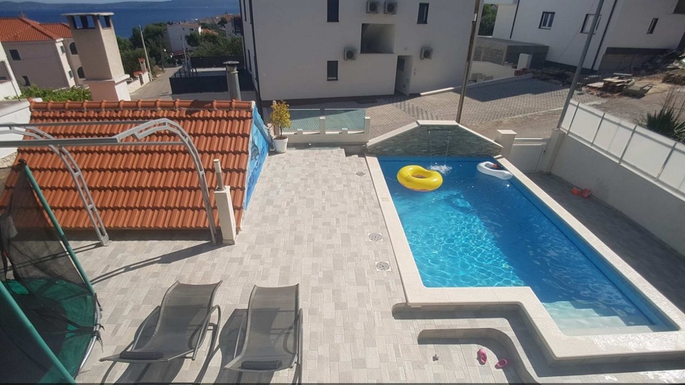 View from a balcony of the terrace and swimming pool