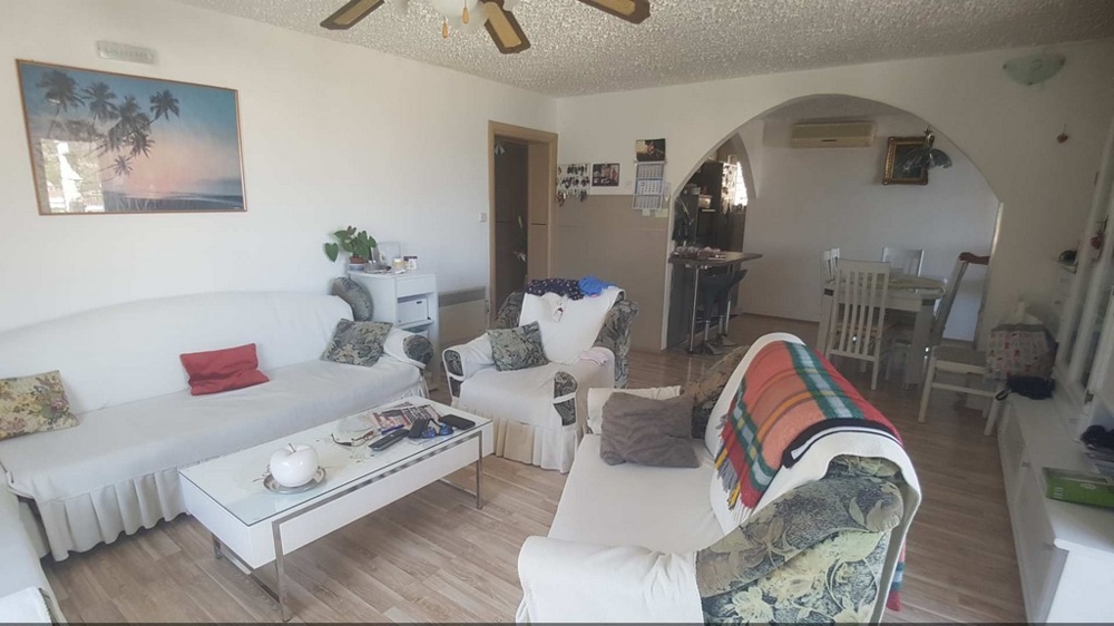 A living room with seating of the property