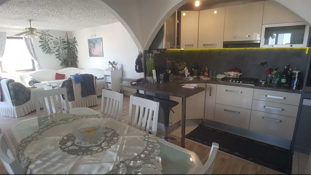 Living and dining area with kitchenette from H1448
