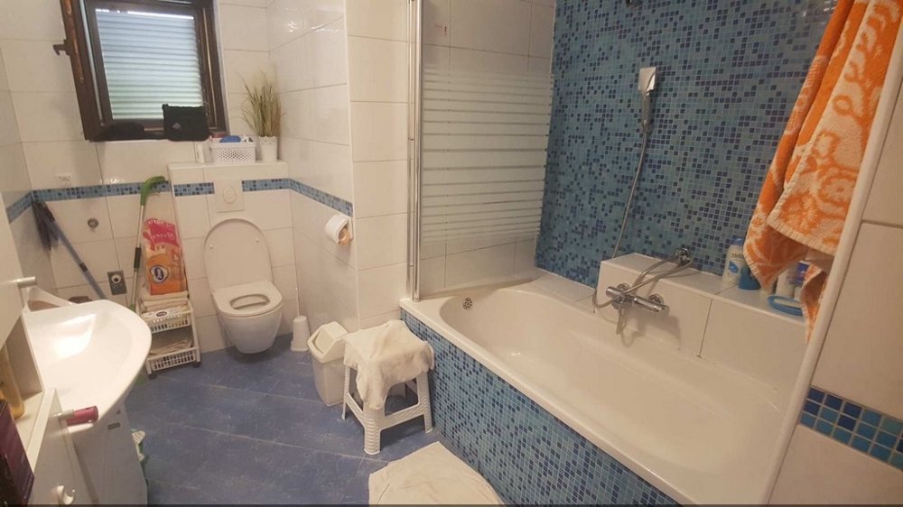 Bathroom with bathtub and toilet