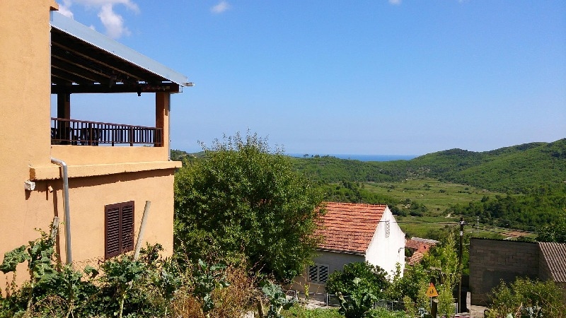 View of the house and the surrounding area in the countryside and the sea - buy a house in Croatia.