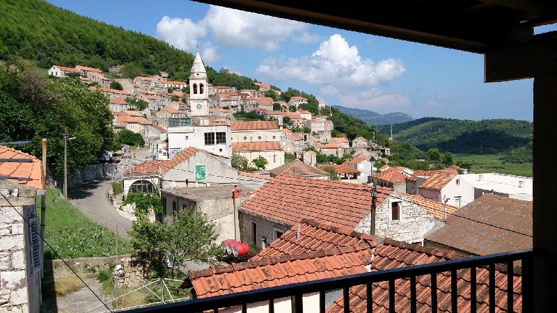 Closer view of the village from the covered balcony - buy a stone house in Croatia.