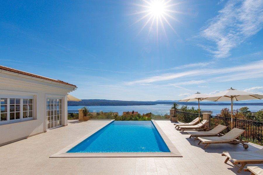 Terrace with infinity swimming pool of Villa H1919 in Crikvenica, Kvarner Bay.