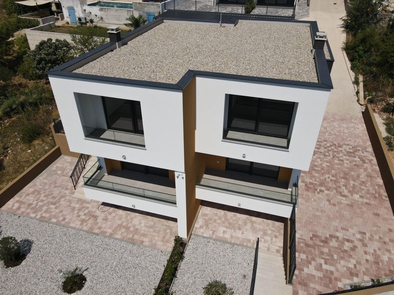 House with two residential units in Dramalj near Crikvenica from above, flat roof and paved driveway - H2197